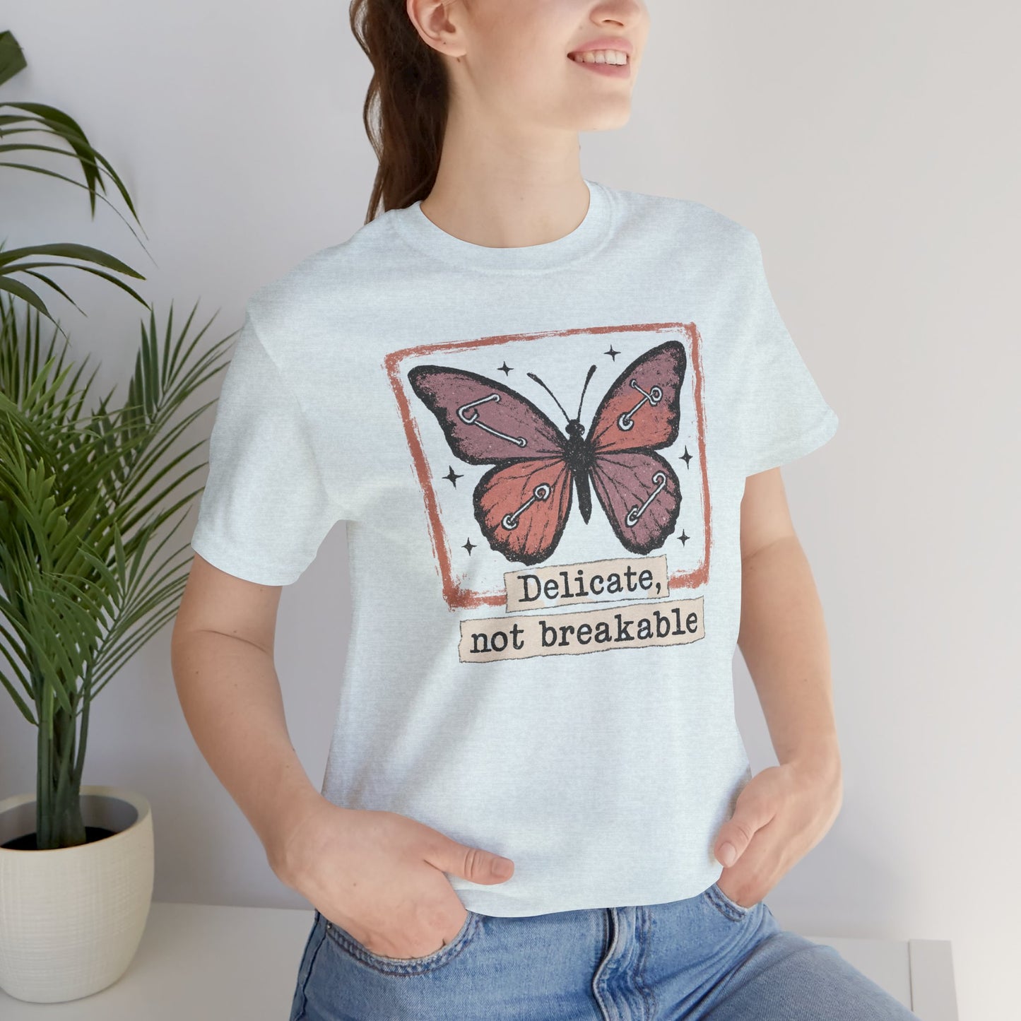 Delicate Not Breakable Butterfly Pocket Tee – Minimalist Affirmation T-Shirt, Self Love & Resilience Quote Shirt