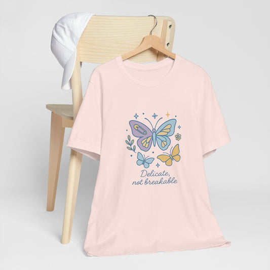 Delicate Not Breakable T-Shirt – Empowering Butterfly Graphic Tee for Inner Strength