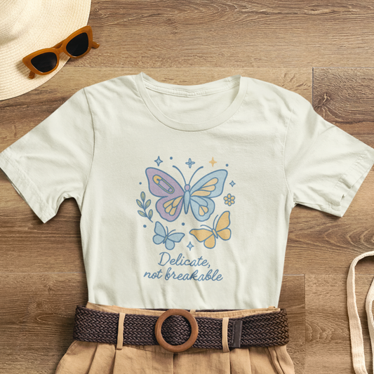 Delicate Not Breakable T-Shirt – Empowering Butterfly Graphic Tee for Inner Strength
