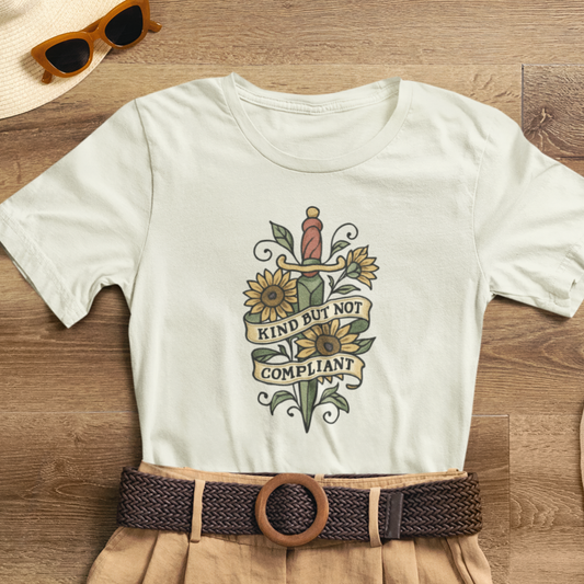 Kind But Not Compliant T-Shirt – Feminine Power Sword & Sunflowers Tattoo-Style Tee