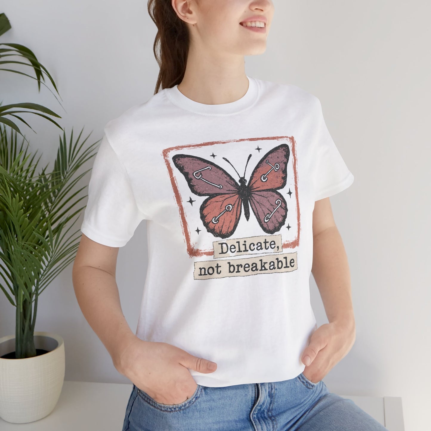 Delicate Not Breakable Butterfly Pocket Tee – Minimalist Affirmation T-Shirt, Self Love & Resilience Quote Shirt