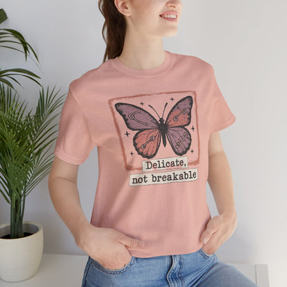 Delicate Not Breakable Butterfly Pocket Tee – Minimalist Affirmation T-Shirt, Self Love & Resilience Quote Shirt