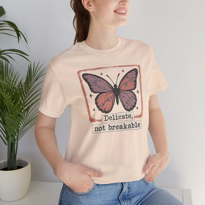 Delicate Not Breakable Butterfly Pocket Tee – Minimalist Affirmation T-Shirt, Self Love & Resilience Quote Shirt