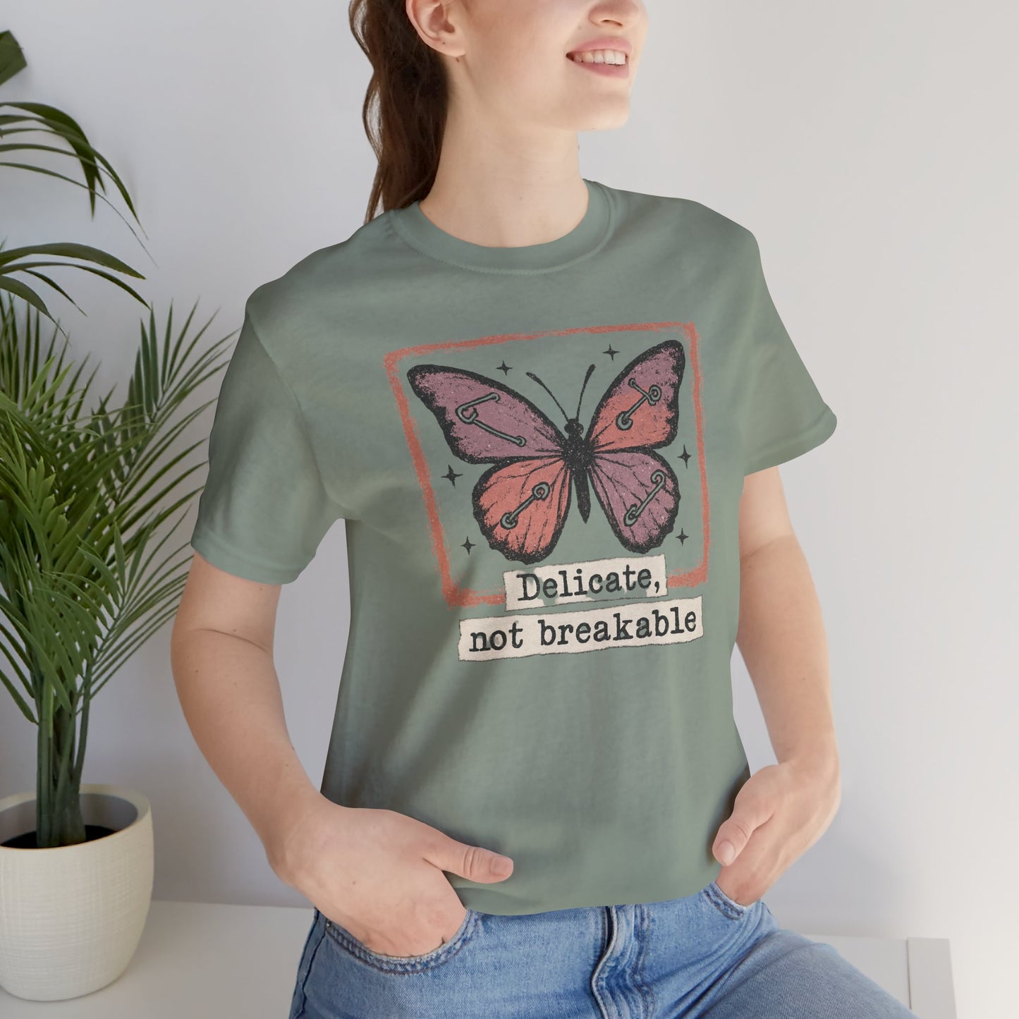 Delicate Not Breakable Butterfly Pocket Tee – Minimalist Affirmation T-Shirt, Self Love & Resilience Quote Shirt