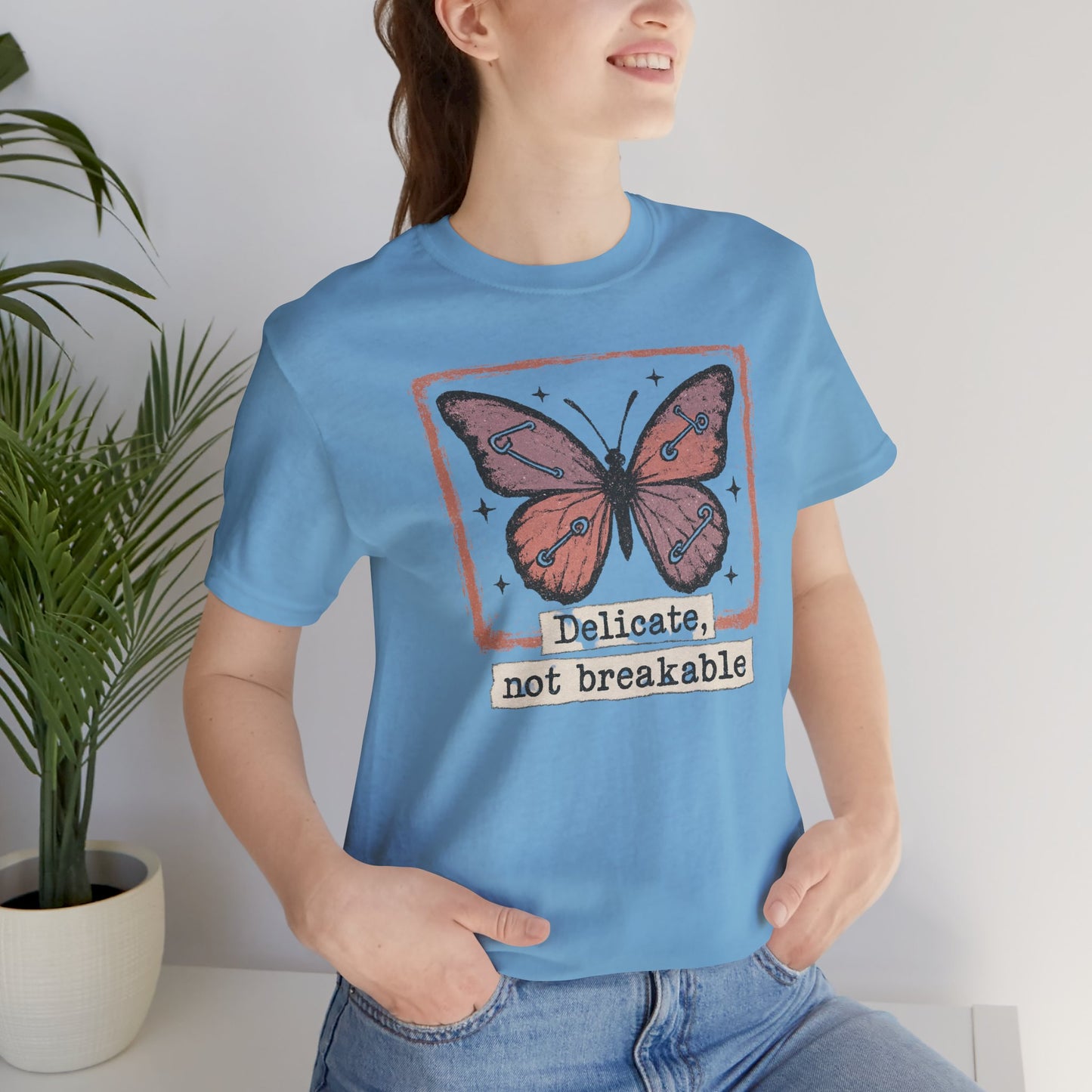 Delicate Not Breakable Butterfly Pocket Tee – Minimalist Affirmation T-Shirt, Self Love & Resilience Quote Shirt