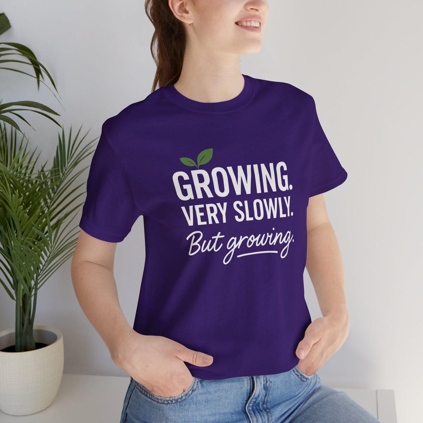 Cream-colored T-Shirt with "Growing Very Slowly But Growing" printed front, promoting gentle growth and emotional healing.