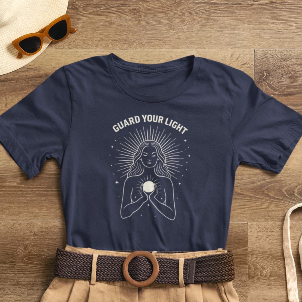 Sacred Feminine graphic tee featuring "Guard Your Light" design, perfect for women seeking spiritual connection.