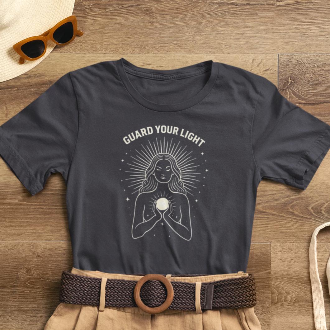 Sacred Feminine graphic tee featuring "Guard Your Light" design, perfect for women seeking spiritual energy protection.