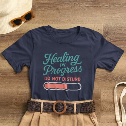 Soft emotional healing t-shirt featuring "Healing in Progress" text, ideal for mental health awareness and personal boundaries.