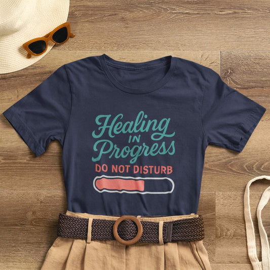 Soft emotional healing t-shirt featuring "Healing in Progress" text, ideal for mental health awareness and personal boundaries.