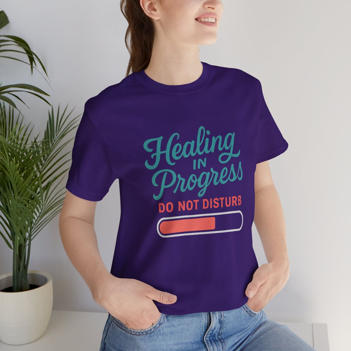 Soft t-shirt with "Healing in Progress - Do Not Disturb" typography, promoting emotional healing and mental health awareness.
