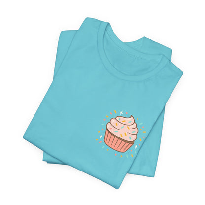 Printify cupcake graphic t-shirt with sassy quote, front and back view, featuring colorful cupcake illustrations and playful design.