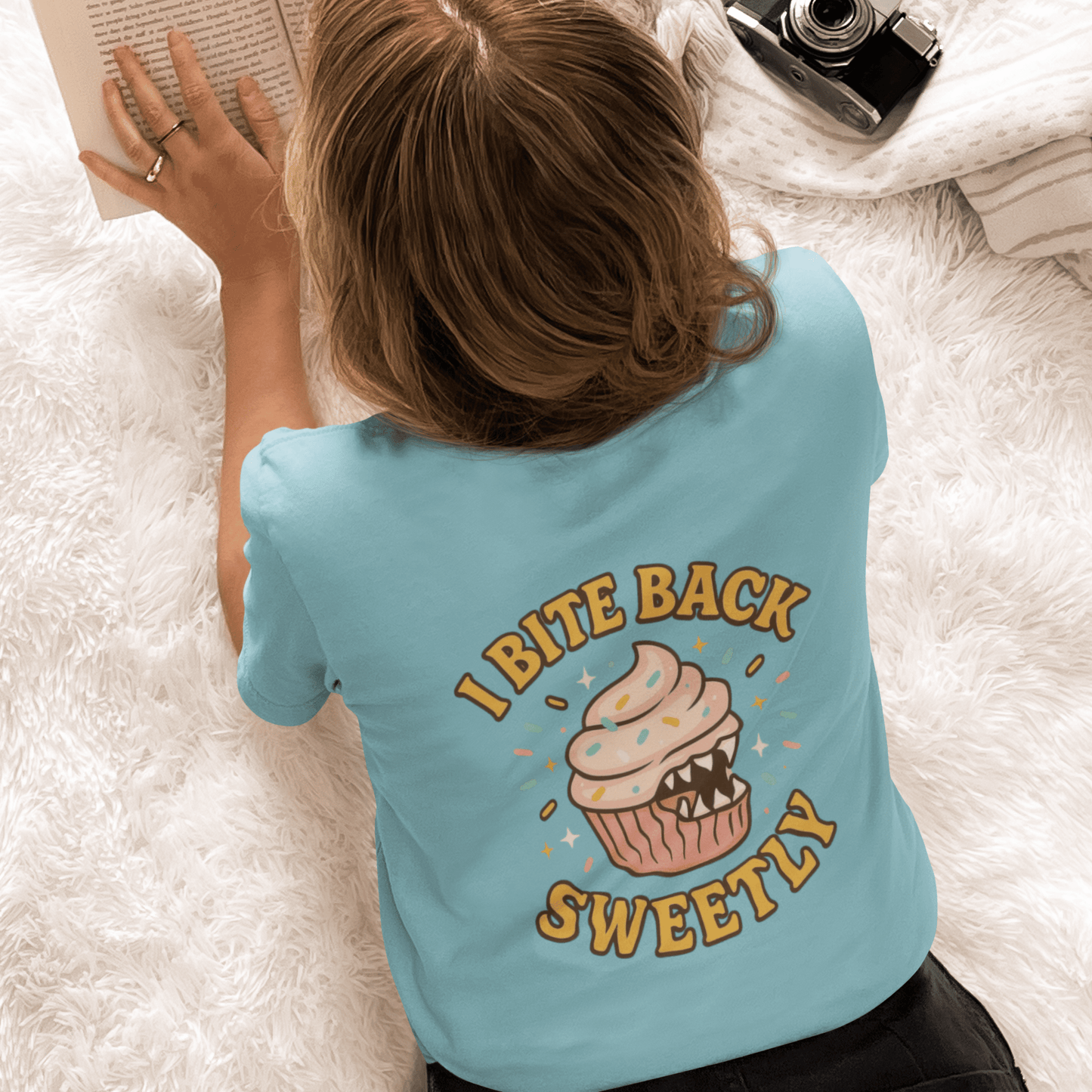 Printify I Bite Back Sweetly T-shirt featuring front and back cupcake graphic and sassy quote, casual graphic tee.