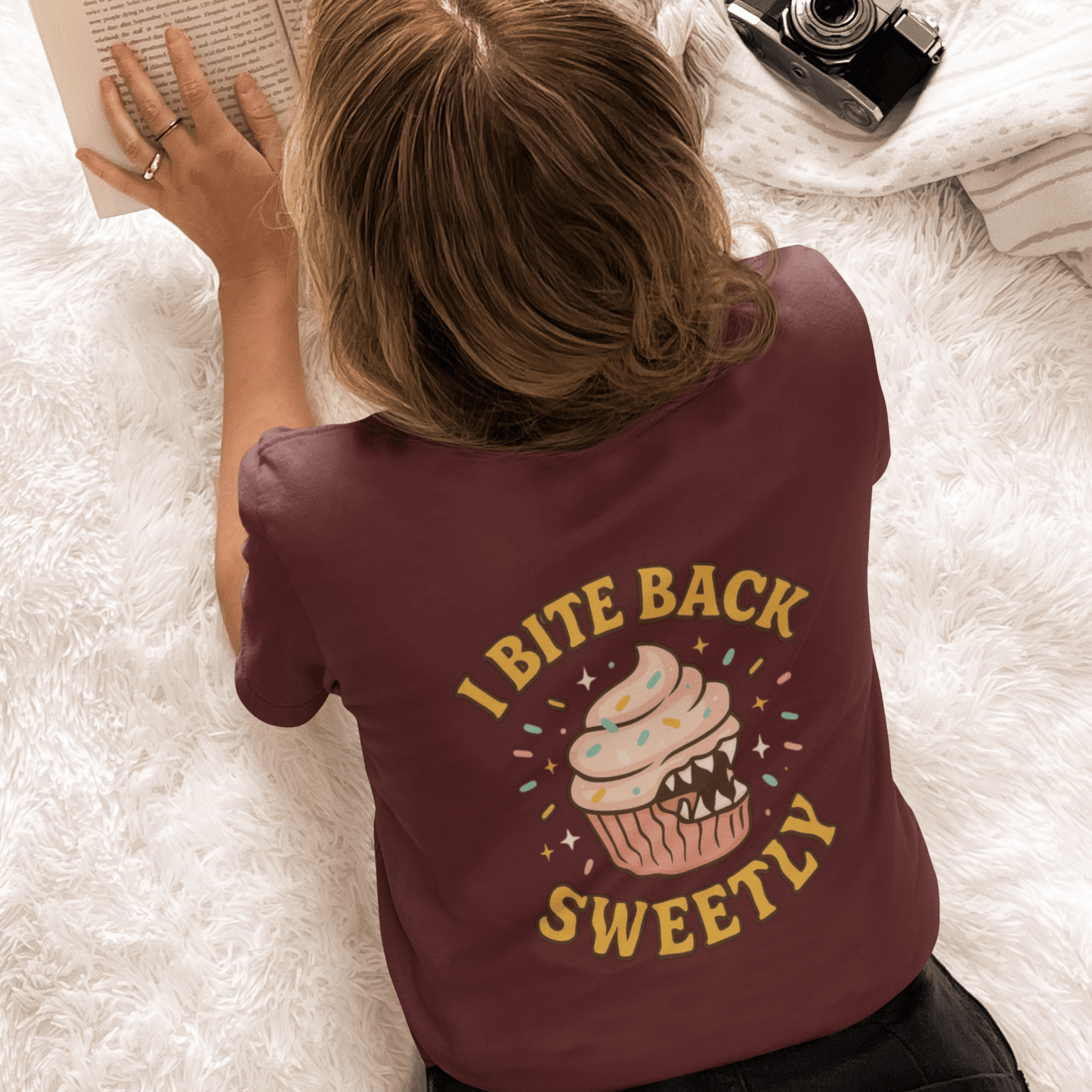 Printify I Bite Back Sweetly T-shirt with cupcake graphic and sassy quote, front and back view of the stylish graphic tee.