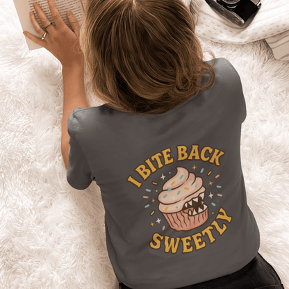 Printify I Bite Back Sweetly T-shirt with cupcake graphic and sassy quote, front and back view, casual graphic tee for women.