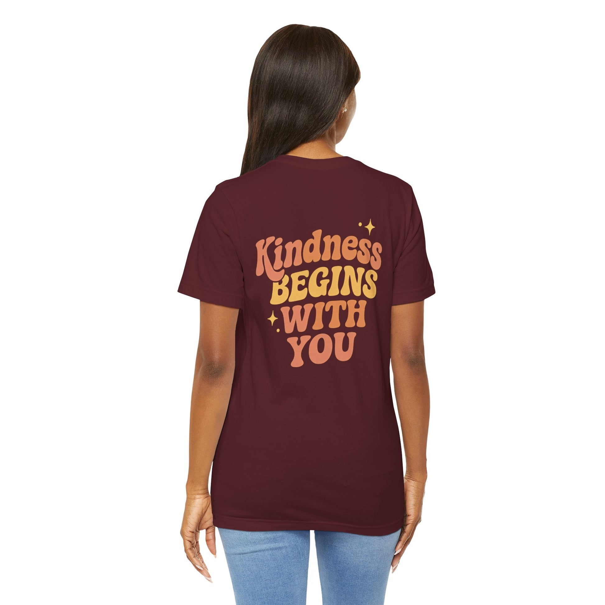 Printify kindness begins with you T-shirt featuring positive affirmation and mental health self-care graphic design on front and back.