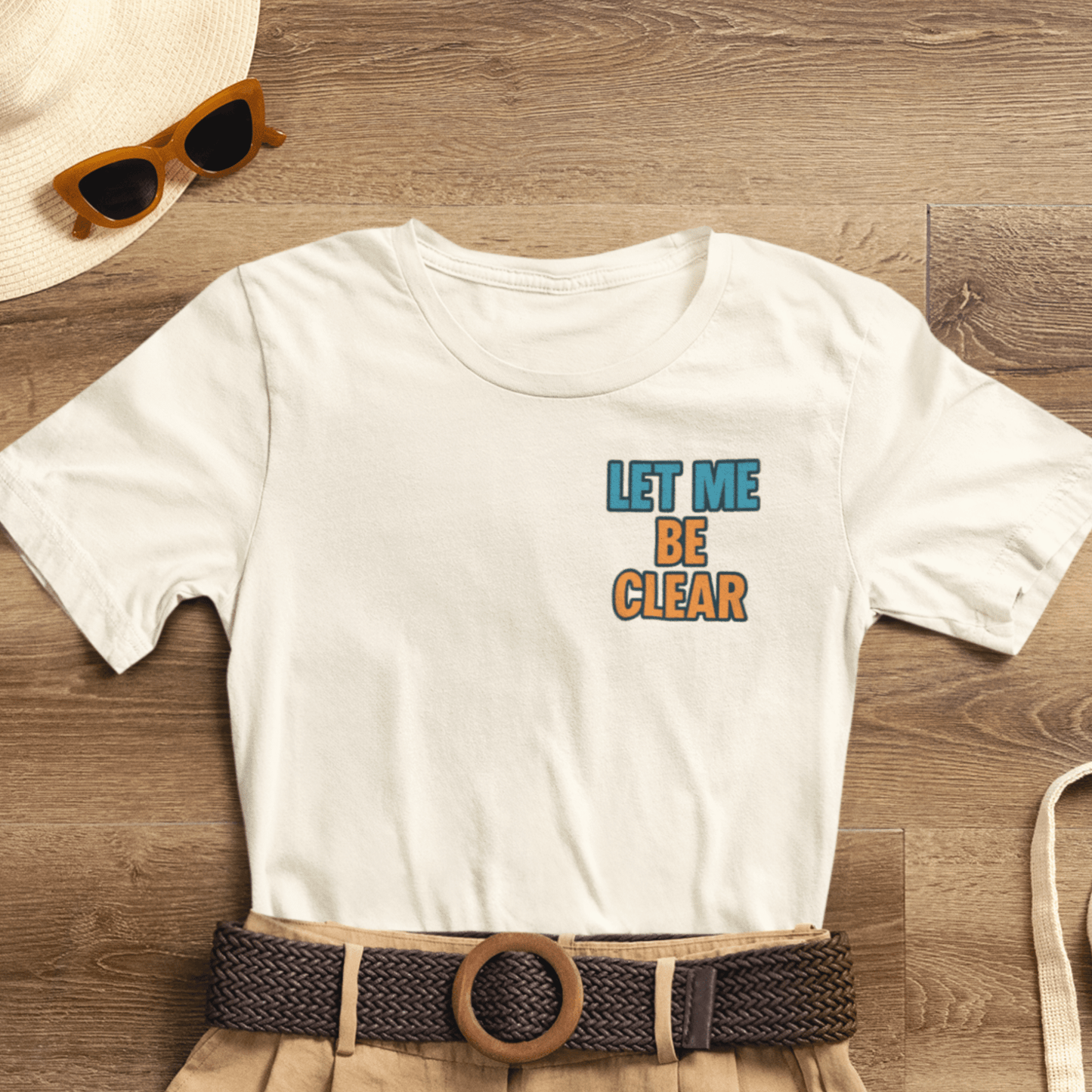 Let Me Be Clear T-Shirt by Printify featuring retro pop art feminist graphic design with the text "I Sparkle on My Terms."