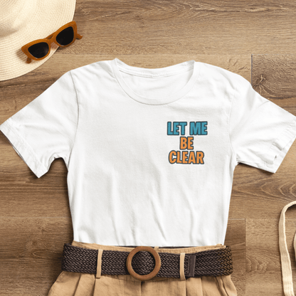 Let Me Be Clear T-Shirt by Printify featuring retro pop art feminist graphic with sparkles and bold text design.