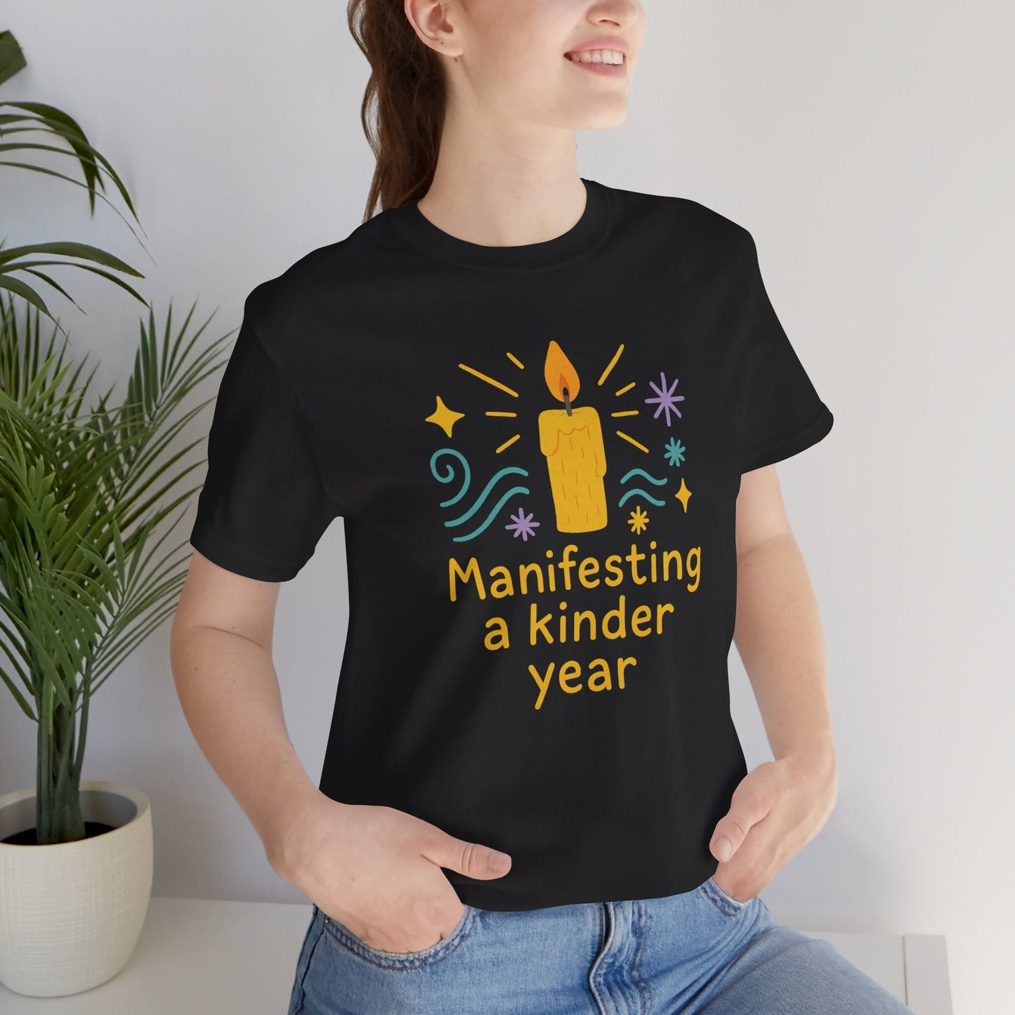 Soft spiritual graphic tee featuring "Manifesting a Kinder Year" for mindful positivity by Printify.
