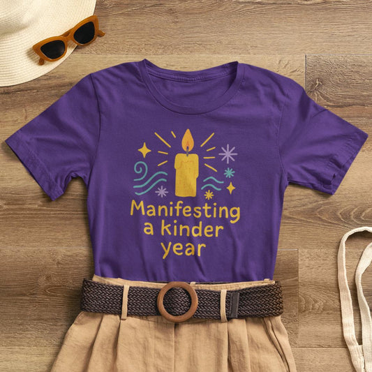 Soft spiritual graphic tee featuring "Manifesting a Kinder Year" design by Printify for positive New Year vibes.