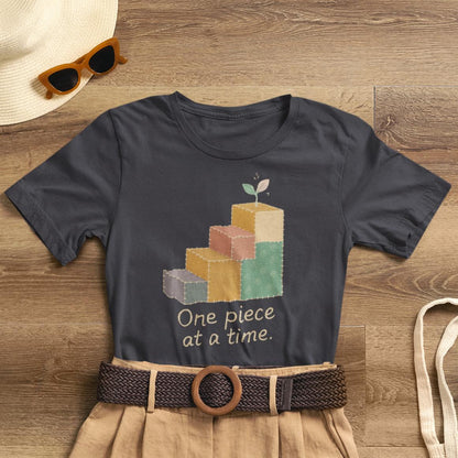 Printify One Piece at a Time T-Shirt with patchwork design, gentle progress theme, and emotional healing message.