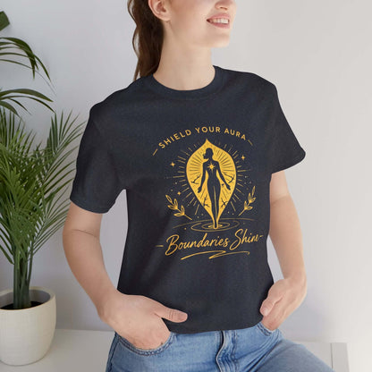 Shield Your Aura T-Shirt featuring a spiritual empowerment design, showcasing a bold, colorful graphic on a comfortable fabric tee.