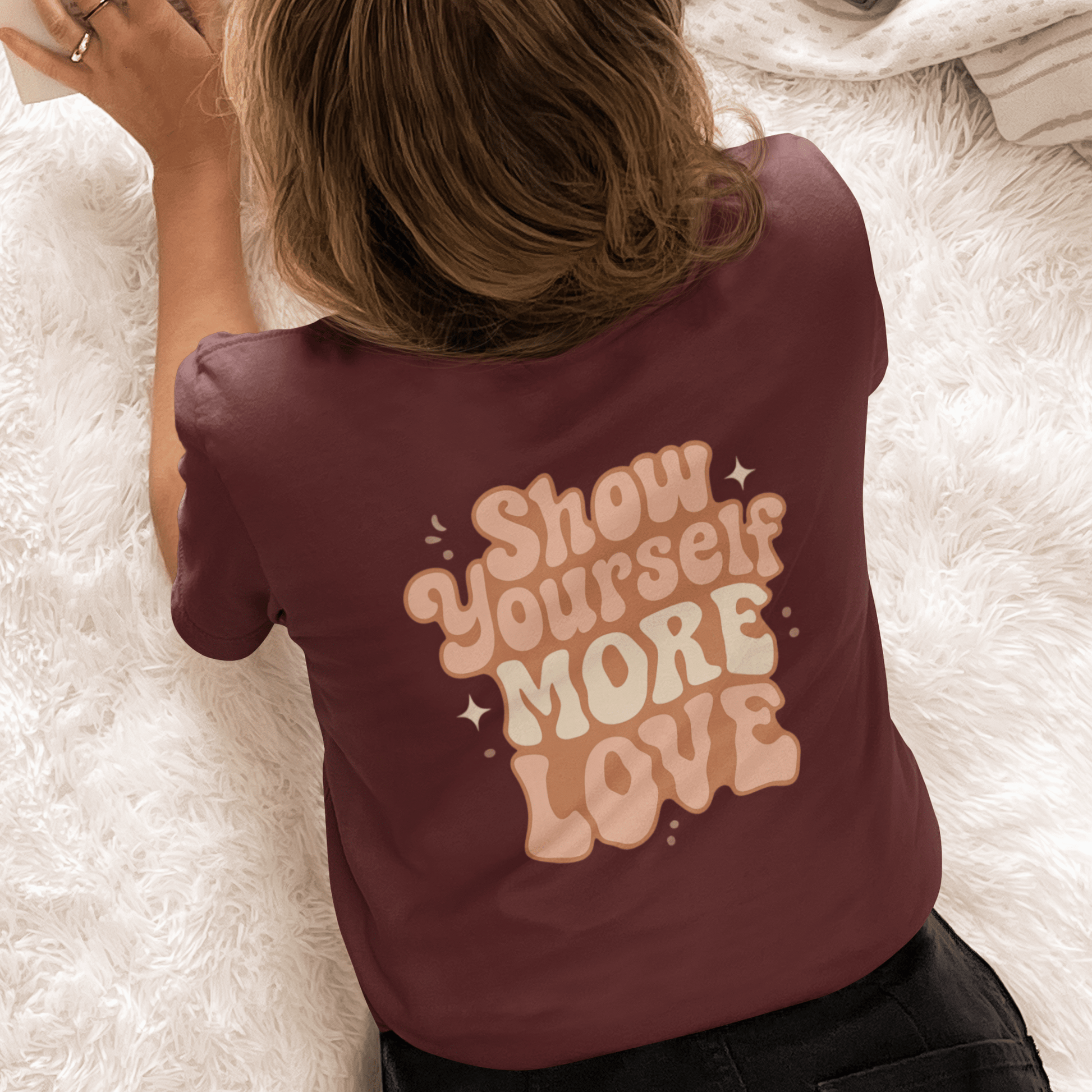 Printify self-care affirmation T-shirt featuring retro comfort style, with uplifting "Show Yourself More Love" message in vibrant colors.