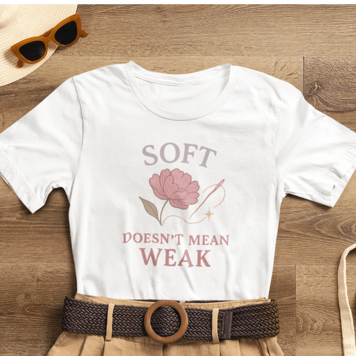 Feminist floral empowerment T-shirt by Printify with soft fabric and bold message, featuring colorful floral design on the front.