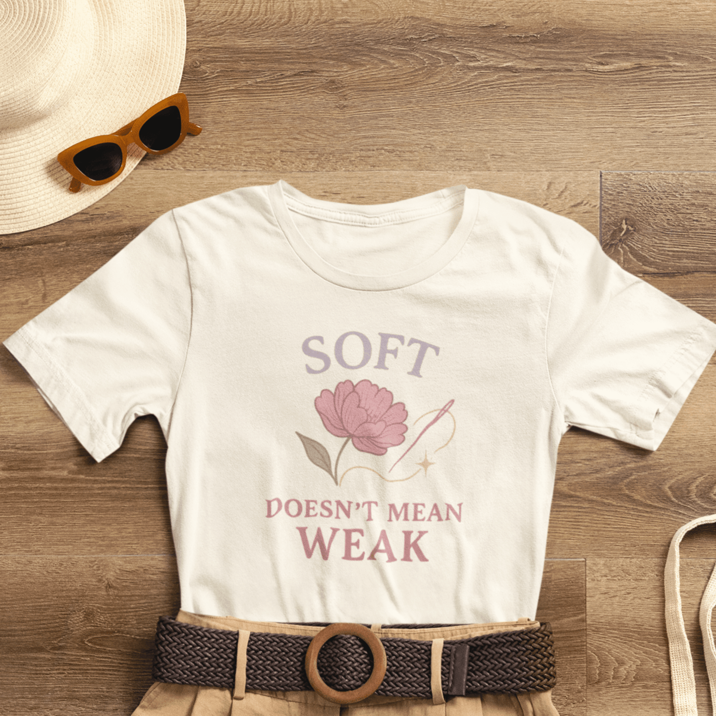 Feminist floral empowerment T-shirt by Printify with bold message, soft fabric, and vibrant floral design.
