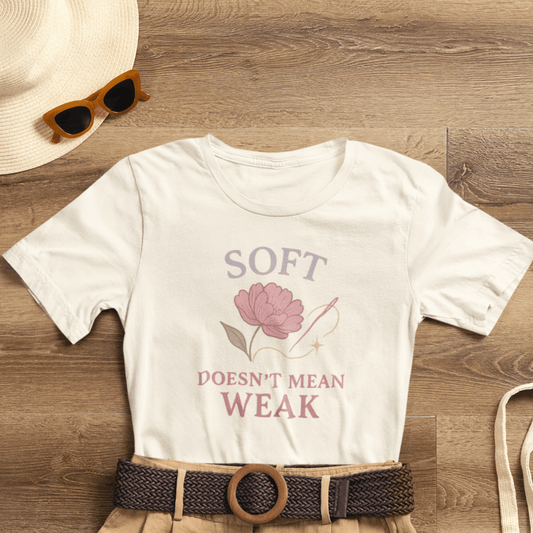 Feminist floral empowerment T-shirt by Printify with bold message, soft fabric, and vibrant floral design.
