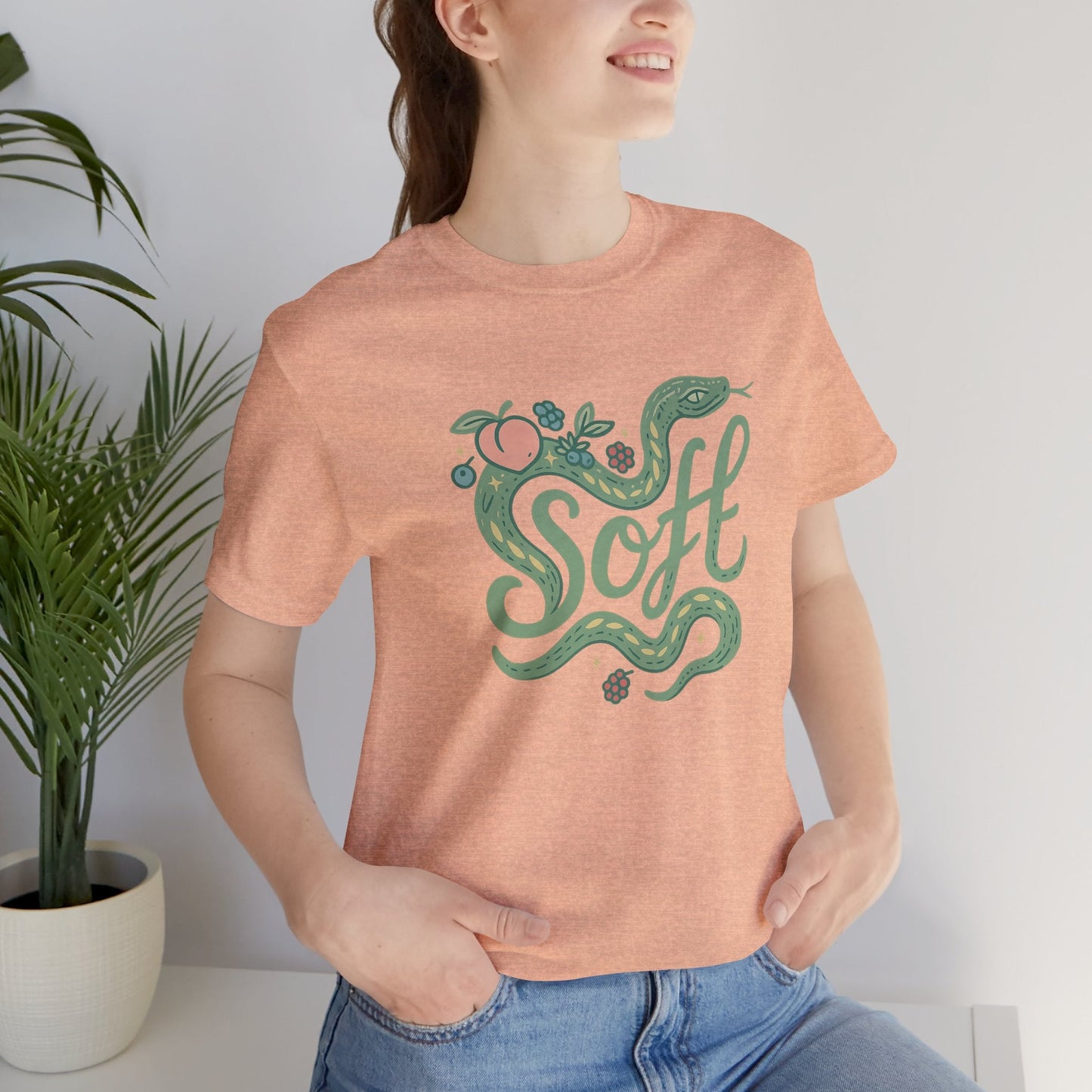 Soft snake graphic tee featuring a botanical serpent design, ideal for unisex wear and inspired by nature.