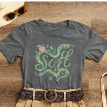 Soft snake graphic tee featuring a botanical serpent design, perfect for nature-inspired unisex fashion by Printify.