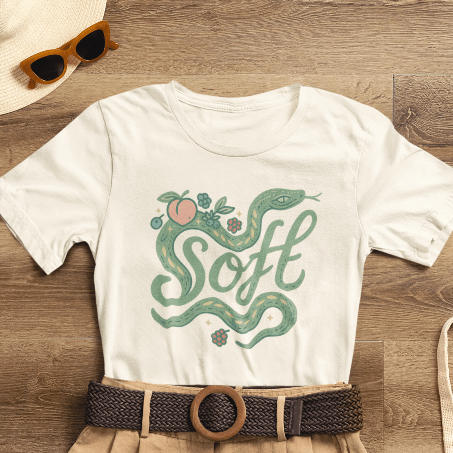 Unisex Soft Snake Graphic Tee featuring a botanical serpent design in a mystical nature-inspired style.