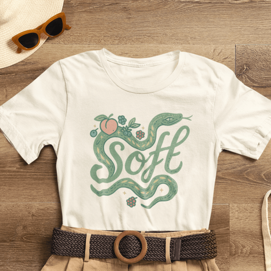 Unisex Soft Snake Graphic Tee featuring a botanical serpent design in a mystical nature-inspired style.