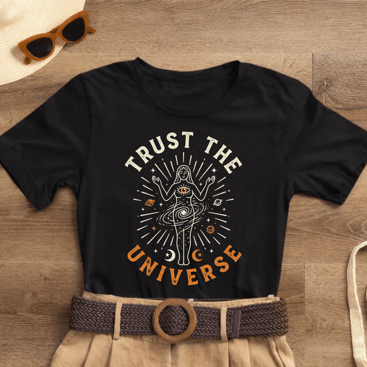 Set of three Spirit Stitch empowerment tees from The Spiritual Essence Trio collection displayed flat with inspiring designs.