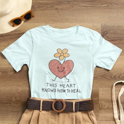Doodle T-Shirt featuring a cute flower and heart design, emphasizing healing, by Printify, shown in a front view.