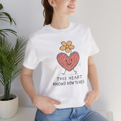 Doodle T-Shirt featuring a flower heart design and healing theme, casual printify brand tee with colorful floral artwork.