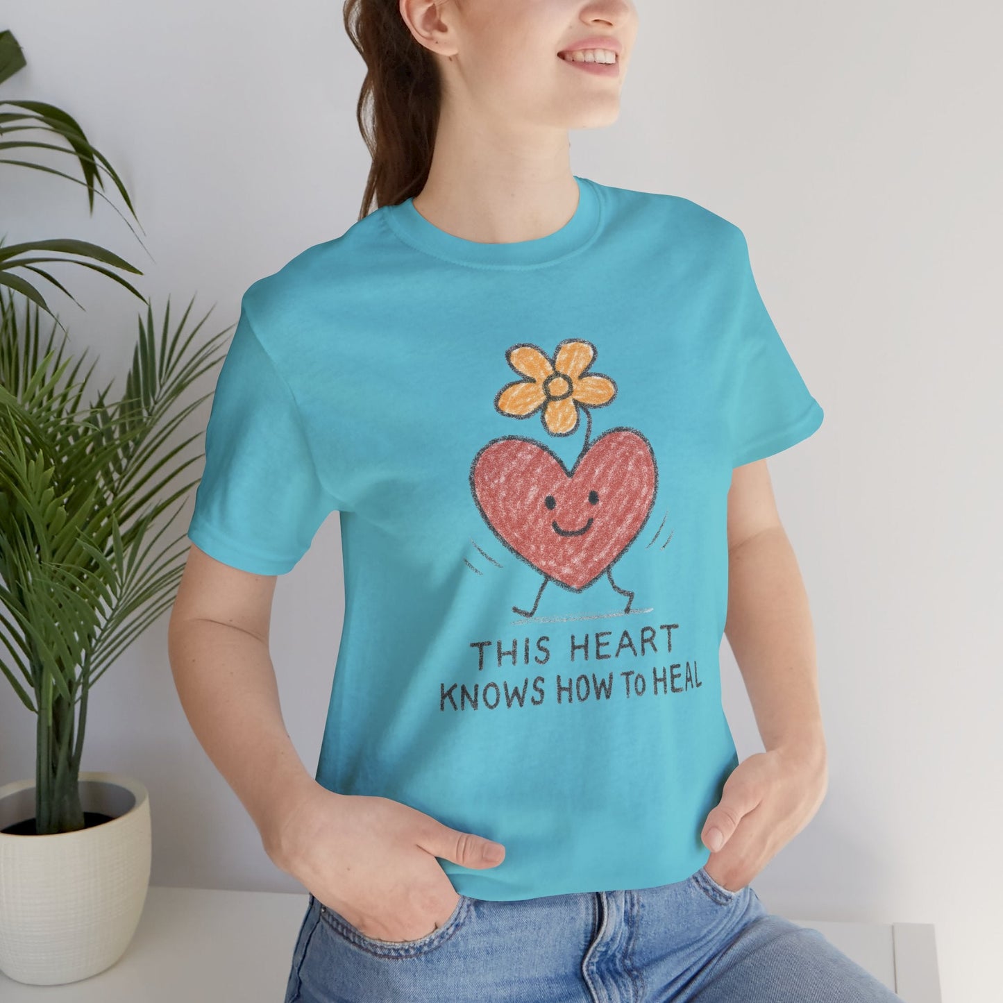 Heart and flower doodle T-shirt by Printify featuring a healing-themed design, perfect for a cute and meaningful casual look.
