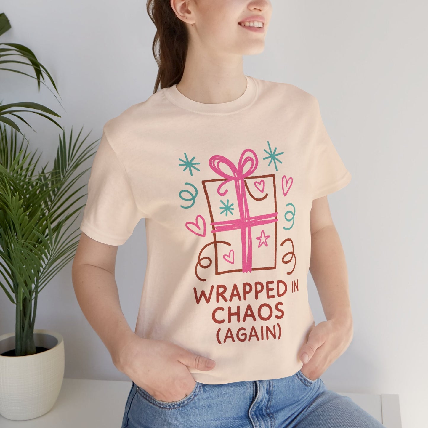 Wrapped in Chaos (Again) – Cozy Emotional Humor T-Shirt - Spirit Stitch