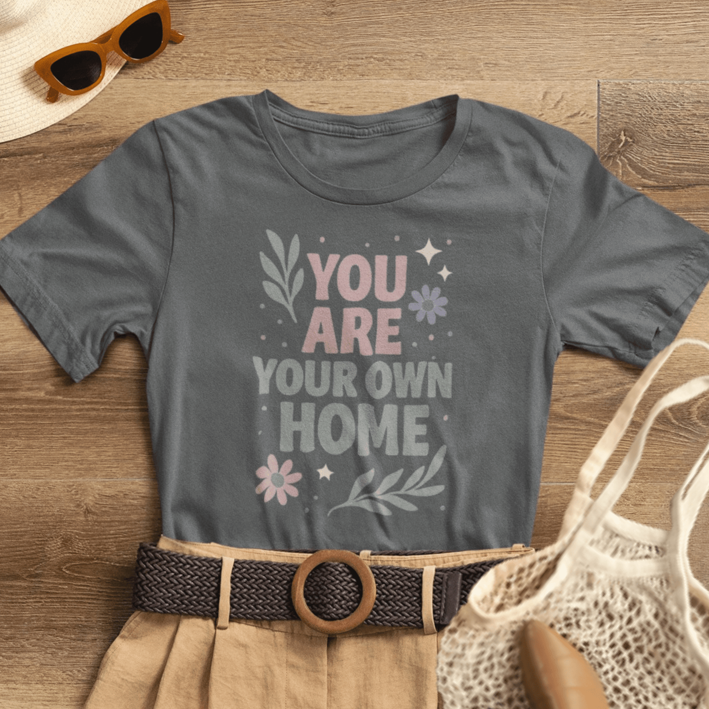 Gray "You Are Your Own Home" T-Shirt by Printify featuring a gentle reminder message for self-love and healing.